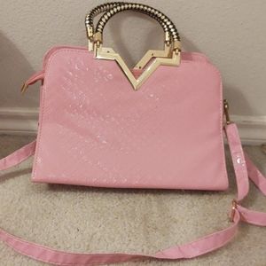 A non used pink purse